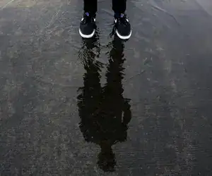 self reflection in a puddle